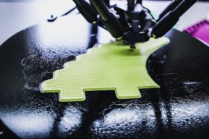 3D Printing on Black canvas with Green filament