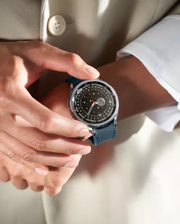 Closeup of the Galaxy Watch6 Classic smartwatch on a wrist, highlighting the mechanical rotating dial.