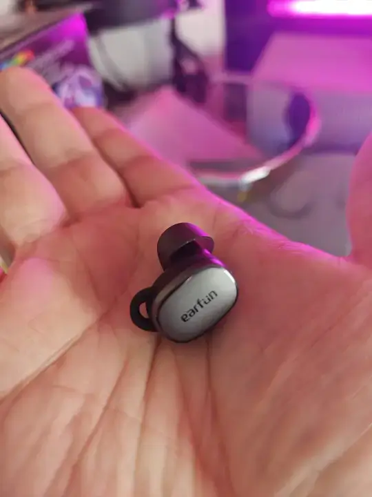 Image of the Earfun Free Pro 3 wireless earbuds, highlighting their sleek design and compact size.