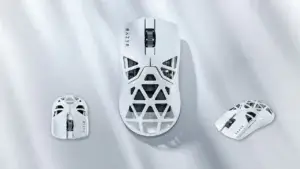 Razer viper mini signature edition in white, an ultralight gaming mouse with a pristine white magnesium alloy exoskeleton, showcased on a reflective surface.