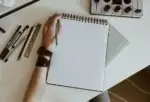 The Left-Handed Life: Unique Challenges and Solutions – 17 Powerful Insights | Smart Tech, Sharp Takes - CRYOVEX.com Left-handed person using everyday tools in a right-handed world, highlighting common challenges and practical solutions