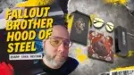 Reviewer wearing gunnar fallout brotherhood of steel glasses with product accessories including case, pouch, and lenses displayed