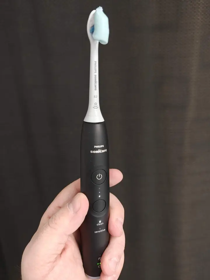 Philips Sonicare Series 6100 Review: A Surprisingly Thoughtful Toothbrush | Smart Tech, Sharp Takes - CRYOVEX.com Philips sonicare series 6100 toothbrush with toothpaste applied, ready for daily brushing