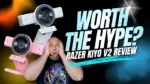 Razer Kiyo V2 webcam review: A Complete 4K Test, Pros, Cons & Is It Worth It in 2026? | Smart Tech, Sharp Takes - CRYOVEX.com Razer kiyo v2 webcam in pink, white, and black with reviewer reaction asking if it is worth the hype