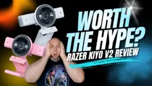 Razer kiyo v2 webcam in pink, white, and black with reviewer reaction asking if it is worth the hype