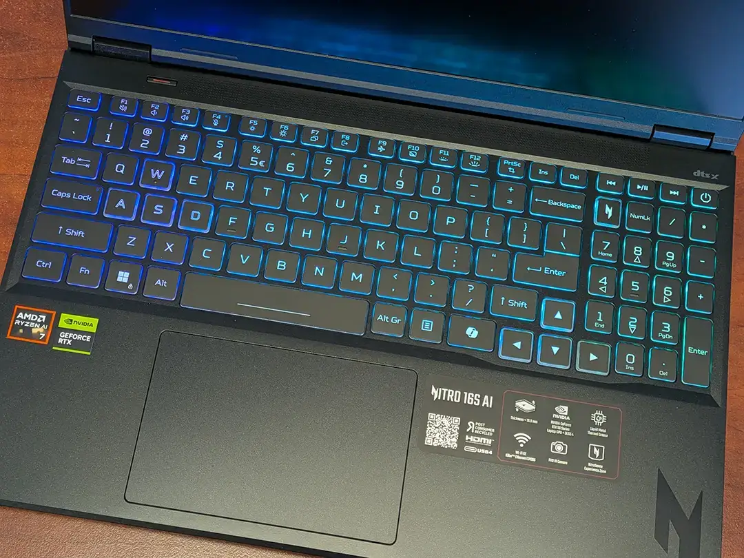 Acer Nitro 16S AI review: Affordable gaming and AI smarts | Smart Tech, Sharp Takes - CRYOVEX.com The backlit keyboard on the acer nitro 16s ai gaming laptop.