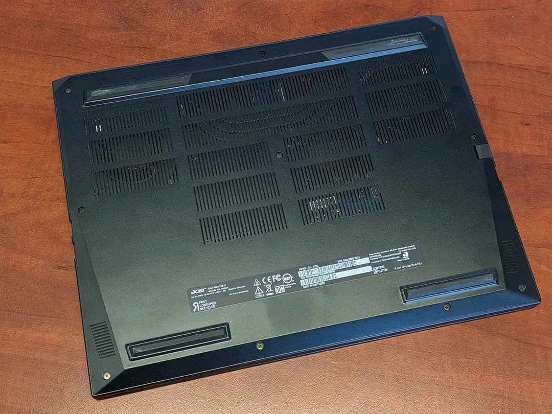 Acer Nitro 16S AI review: Affordable gaming and AI smarts | Smart Tech, Sharp Takes - CRYOVEX.com The bottom view of the acer nitro 16s ai gaming laptop.