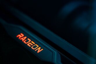 Detailed view of a glowing radeon graphics card highlighting its hardware design.