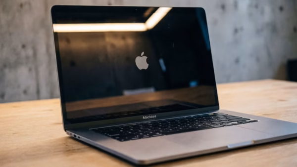 Conceptual rendering of a sleek macbook pro with an oled touchscreen display