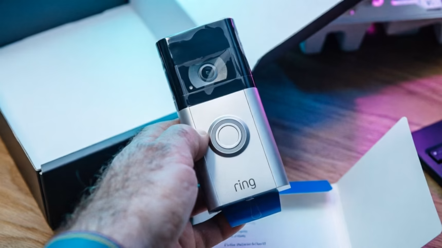 A modern white ring video doorbell mounted on a brick wall next to a sleek black echo show display showing a live camera feed.